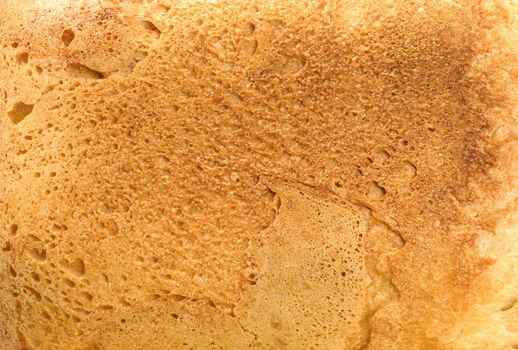 Background of fresh bread. The Piece of bread.