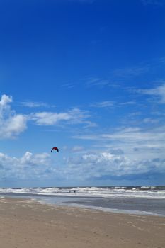kitesurfing on the sand beach in Zaandvort aan Zee