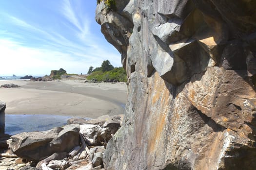 Large rocks and debries on the beach, Oregon coast.