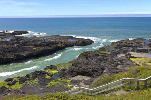 Rocky lava shoreline at Cape Perpetua Oregon coast.