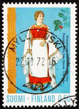 FINLAND - CIRCA 1972: a stamp printed in the Finland shows Costume from Perni, 12th Century, Regional Costume, circa 1972