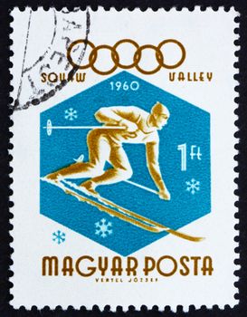 HUNGARY - CIRCA 1960: a stamp printed in the Hungary shows Downhill Skier, Winter Olympic sports, Squaw Valley 60, circa 1960