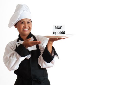Smiling asian woman as restaurant chef with a plate and label in the hand