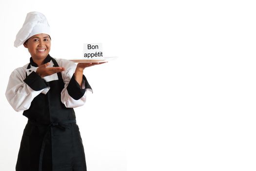 Smiling asian woman as restaurant chef with a plate and label in the hand
