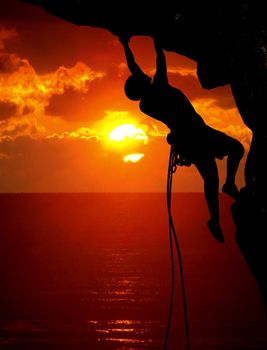 rock climbing during sunset