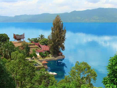   Lake Toba (Indonesian: Danau Toba) is a lake and supervolcano. The lake is 100 kilometres long and 30 kilometres wide, and 505 metres (1,666 ft) at its deepest point.                                   