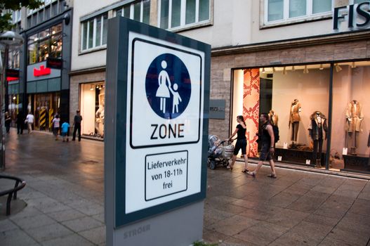 STUTTGART, GERMANY, JULY 10: People walking in shopping area in Stuttgart, Germany on July 10, 2011.