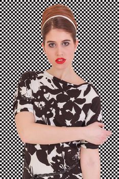 Portrait of a black / white-dressed woman in front of a black / white background