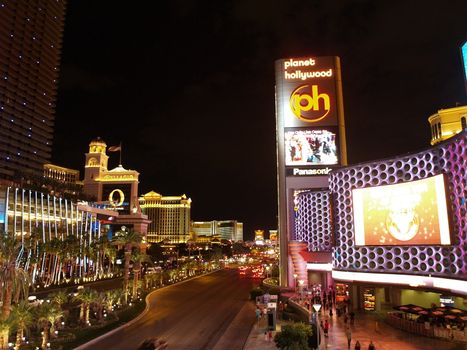 LAS VEGAS - SEPTEMBER 25: Traffic travels along the Las Vegas strip on September 25, 2011 in Las Vegas. The strip is approximately 4.2 mi (6.8 km) long.