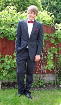 teenager in prom suit