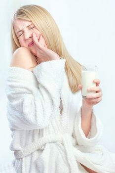 Blond hair girl do not like taste of milk