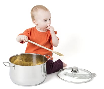 baby with big cooking pot isolated on white background
