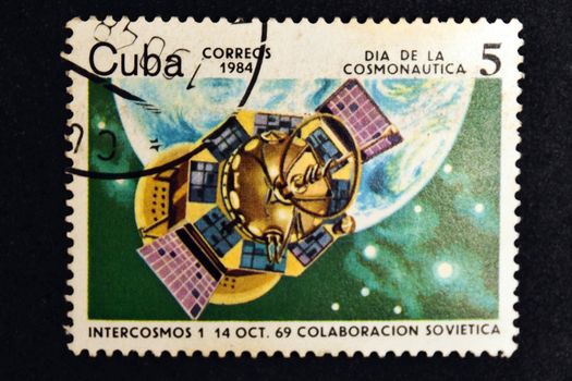 CUBA CIRCA 1984: stamp printed by CUBA, shows Cosmonautics Day - Intercosmos January 14 October 69 Soviet cooperation, CIRCA 1984