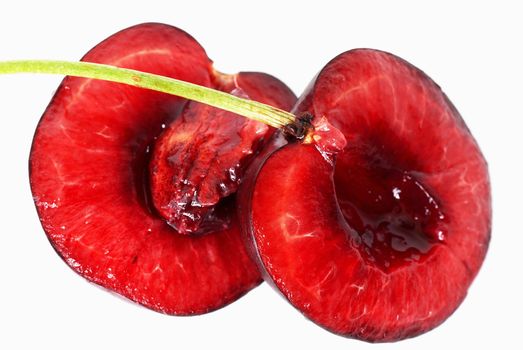 one ripe red cherry on white background