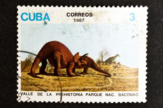 CUBA CIRCA 1987: stamp printed by CUBA, shows dinosaurs - Prehistory birth of Valley Park Baconao , CIRCA 1987