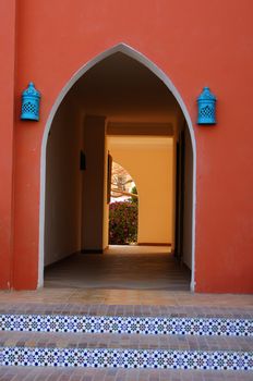 Arabic architecture; walkway with wall lamps                 