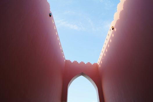 Arabic architecture: red walled building 