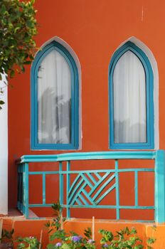 Arabic architecture: two windows and terrace                