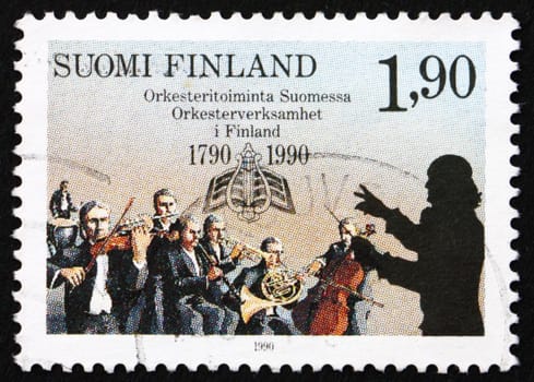 FINLAND - CIRCA 1990: a stamp printed in the Finland shows Finnish Orchestras and Musical Society of Turku, 200th Anniversary, circa 1990
