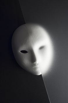 plaster mask in studio, when compared to the good or bad.