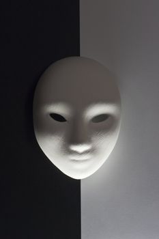 plaster mask in studio, when compared to the good or bad.