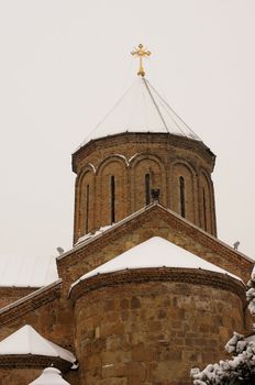 Winter view to covered with snow Tbilisi Old town in misty day