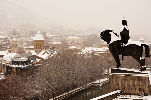 Winter view to covered with snow Tbilisi Old town in misty day