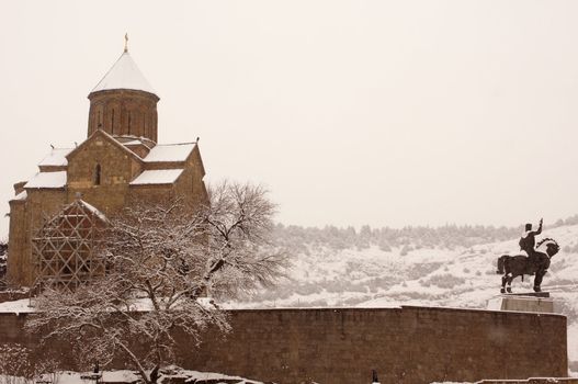 Winter view to covered with snow Tbilisi Old town in misty day