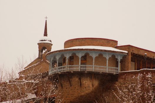 Winter view to covered with snow Tbilisi Old town in misty day