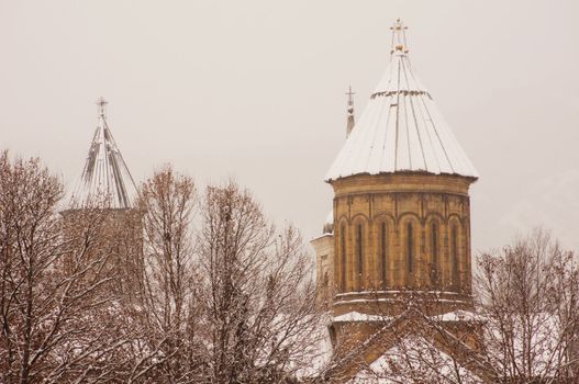 Winter view to covered with snow Tbilisi Old town in misty day