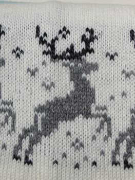reindeer pattern woven on a scarf - detail