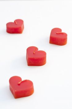 Heart-shaped candles. meaning of love or get married