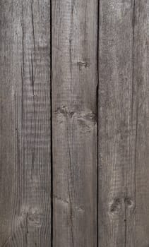 Close up of rough gray wooden boards background