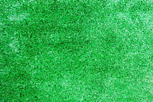 Artificial green grass field top view texture