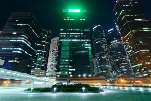 modern office building in downtown city at night