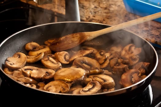 mushrooms frying on the stovetop