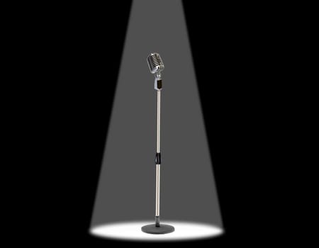 Vintage microphone under spotlight