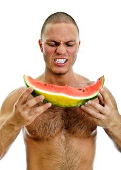 Muscular man holding watermelon. Isolated on white