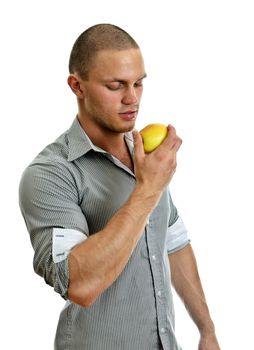 Man eating an apple. Isolated on white.