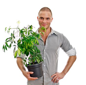 Man holding a pot with plant. Isolated on white background