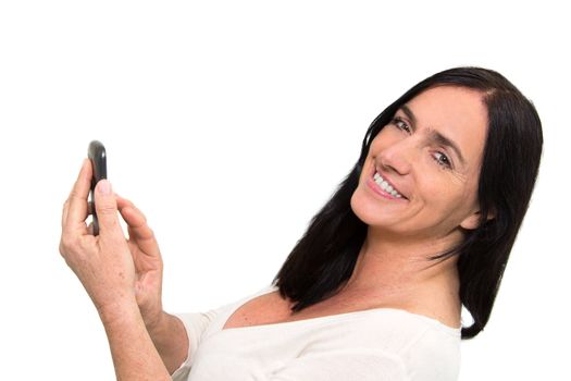Dark haired woman using touchscreen of a Smartphone