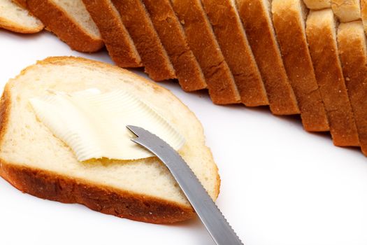 Slices of Wheat Bread with Butter, closeup