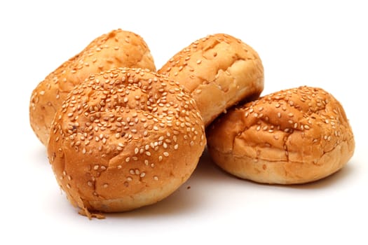 Heap Appetizing Buns with Sesame on white background