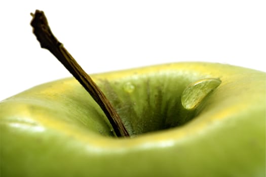 droplet flowing down on apple