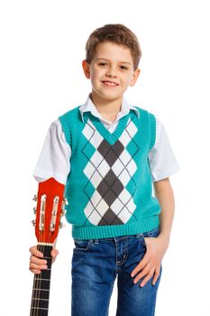 Cute boy with classical guitar. Isolated on white background