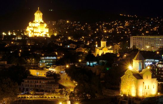 Night view of Tbilisi Old town with ancient churches, castle and president palace