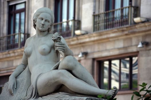 Statue of naked woman at Placa de catalonia in Barcelona, Spain