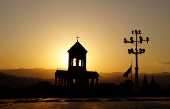 Sunset over the St. Trinity cathedral in Tbilisi, Georgia