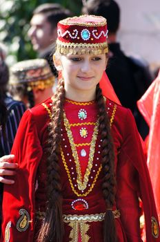 TBILISI, GEORGIA - OCTOBER 9: Participants of Georgian Folk Autumn Festival - Tbilisoba, in adjarian traditional costume dancing Ajaruli dance, October 9, 2011 in Tbilisi, Georgia.