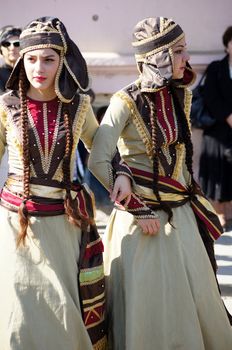 TBILISI, GEORGIA - OCTOBER 9: Participants of Georgian Folk Autumn Festival - Tbilisoba, in adjarian traditional costume dancing Ajaruli dance, October 9, 2011 in Tbilisi, Georgia.